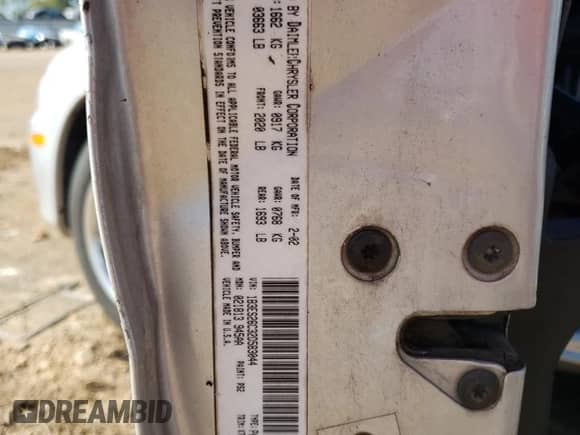 2002 Dodge Neon with VIN 1B3ES26C32D583044, listed as a Copart auction lot 74057444 with 205,484 mi miles and Salvage title. Bid and sale history available at DreamBid. Image 12.