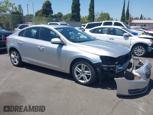2015 Volvo S60 T5 Drive-E Premier with VIN YV126MFB8F2316406, listed as a IAAI auction lot 42517670 with 80,027 mi miles and . Bid and sale history available at DreamBid. Image 1.