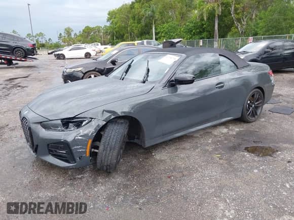 2023 BMW 4 Series 430i with VIN WBA23AT03PCL21070, listed as a IAAI auction lot 42730718 with 19,859 mi miles and . Bid and sale history available at DreamBid. Image 17.