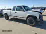 1994 Chevrolet Silverado 2500 with VIN 2GCFK29K9R1129148, listed as a Copart auction lot 46867115 with 441,778 mi miles and Salvage title. Bid and sale history available at DreamBid. Image 4.