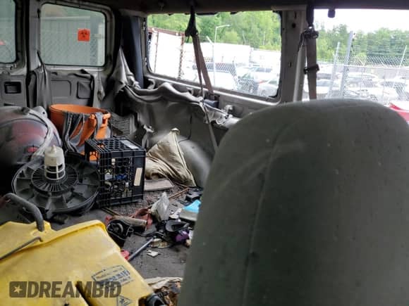 1999 Ford Econoline Cargo with VIN 1FMNE31S7XHB44466, listed as a Copart auction lot 58904415 with Not provided miles and Salvage title. Bid and sale history available at DreamBid. Image 11.