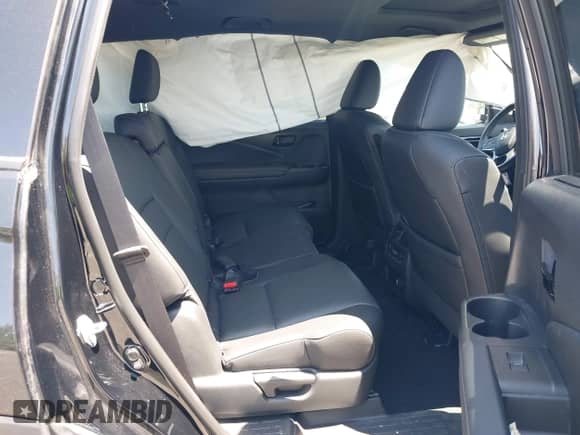 2022 Honda Passport Elite with VIN 5FNYF8H00NB004126, listed as a IAAI auction lot 42401773 with 32,012 mi miles and . Bid and sale history available at DreamBid. Image 8.