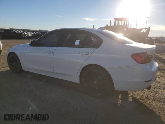 2014 BMW 3 Series 320i with VIN WBA3B1C57EK132461, listed as a Copart auction lot 87267475 with 242,238 mi miles and Clean title. Bid and sale history available at DreamBid. Image 2.