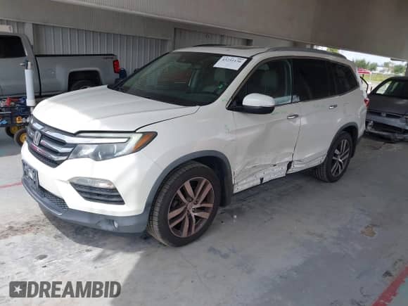 2017 Honda Pilot Touring with VIN 5FNYF5H91HB015492, listed as a IAAI auction lot 43251136 with 131,082 mi miles and . Bid and sale history available at DreamBid. Image 17.