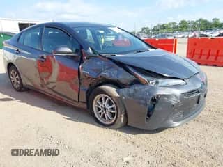 2021 Toyota Prius L Eco with VIN JTDKAMFU2M3147335, listed as a IAAI auction lot 42652103 with 122,658 mi miles and . Bid and sale history available at DreamBid. Image 1.