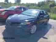 2020 Toyota Camry LE with VIN 4T1C11AKXLU877796, listed as a IAAI auction lot 43384594 with 78,546 mi miles and . Bid and sale history available at DreamBid. Image 17.