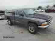 2002 Dodge Dakota с VIN 1B7FL46XX2S511526, выставлен на аукционе Copart как лот 57955594 с пробегом 244 367 миль миль и Списание • Salvage title. История ставок и продаж доступна на DreamBid. Изображение 4.