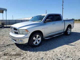 2010 Dodge 1500 SLT with VIN 1D7RB1CT2AS120942, listed as a Copart auction lot 84904935 with 208,726 mi miles and Salvage title. Bid and sale history available at DreamBid. Image 1.