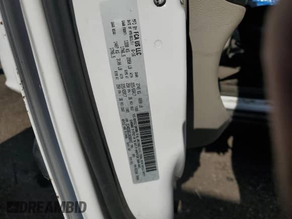 2016 Dodge Grand Caravan American Value z VIN 2C4RDGBG1GR386457, wystawiony jako Copart lot #85206695 z przebiegiem 293 889 mil mil oraz Czysty tytuł • Clean title. Historia ofert i sprzedaży dostępna na DreamBid. Obrazek 13.