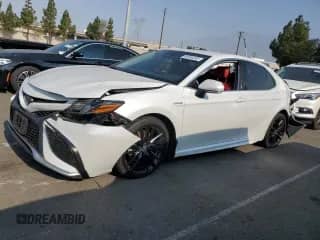 2021 Toyota Camry Hybrid XSE with VIN 4T1K31AKXMU548944, listed as a Copart auction lot 68894265 with 81,648 mi miles and Salvage title. Bid and sale history available at DreamBid. Image 1.