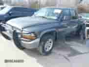 2002 Dodge Dakota SLT with VIN 1B7HL48N52S513091, listed as a IAAI auction lot 41303214 with 158,763 mi miles and . Bid and sale history available at DreamBid. Image 2.