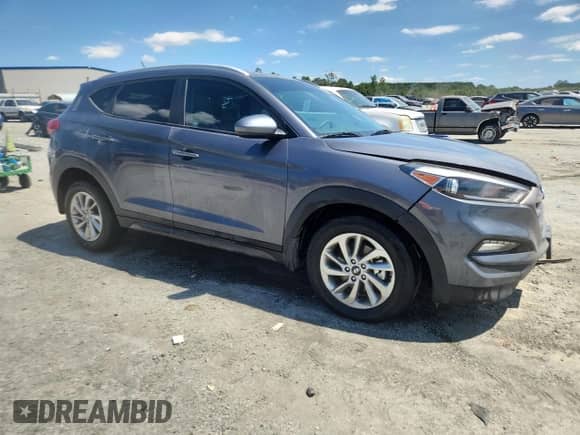 2016 Hyundai Tucson SE z VIN KM8J33A43GU143425, wystawiony jako Copart lot #70264885 z przebiegiem 62 283 mil mil oraz Szkoda całkowita • Salvage title. Historia ofert i sprzedaży dostępna na DreamBid. Obrazek 4.