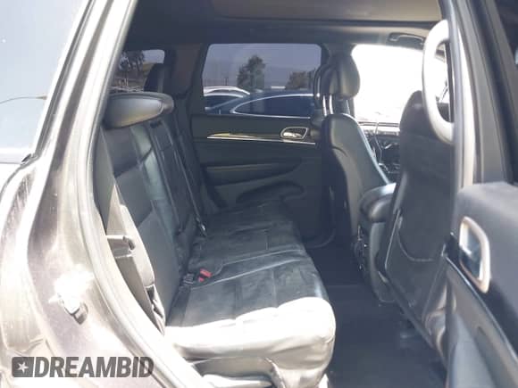 2016 Jeep Grand Cherokee Limited with VIN 1C4RJEBG0GC407269, listed as a IAAI auction lot 42570976 with 77,130 mi miles and . Bid and sale history available at DreamBid. Image 8.