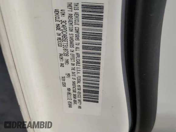 2014 Dodge Journey SE with VIN 3C4PDCAB5ET310739, listed as a Copart auction lot 69391595 with 128,134 mi miles and Salvage title. Bid and sale history available at DreamBid. Image 13.