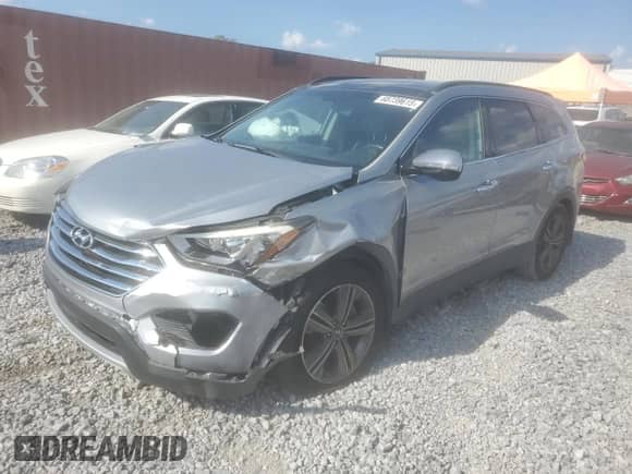 2014 Hyundai Santa Fe GLS z VIN KM8SRDHFXEU068249, wystawiony jako Copart lot #68739615 z przebiegiem Nie podano mil oraz Czysty tytuł • Clean title. Historia ofert i sprzedaży dostępna na DreamBid. Obrazek 1.