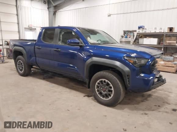 2024 Toyota Tacoma SR5 with VIN 3TMLB5JN3RM054207, listed as a IAAI auction lot 41171946 with 3,808 mi miles and . Bid and sale history available at DreamBid. Image 1.