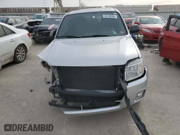 2008 Mercury Mariner with VIN 4M2CU91Z58KJ15755, listed as a Copart auction lot 50168565 with 130,883 mi miles and Salvage title. Bid and sale history available at DreamBid. Image 5.