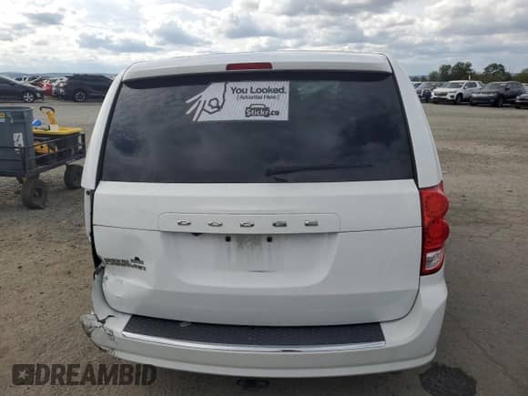 2018 Dodge Grand Caravan SE z VIN 2C4RDGBG4JR133995, wystawiony jako Copart lot #85684795 z przebiegiem 76 547 mil mil oraz Szkoda całkowita • Salvage title. Historia ofert i sprzedaży dostępna na DreamBid. Obrazek 6.