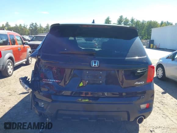 2023 Honda Passport EX-L with VIN 5FNYF8H54PB013071, listed as a IAAI auction lot 43246503 with 35,120 mi miles and . Bid and sale history available at DreamBid. Image 16.