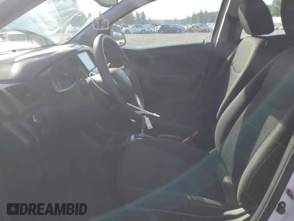 2016 Chevrolet Spark LS with VIN KL8CB6SAXGC585221, listed as a Copart auction lot 82557205 with 65,674 mi miles and Salvage title. Bid and sale history available at DreamBid. Image 7.