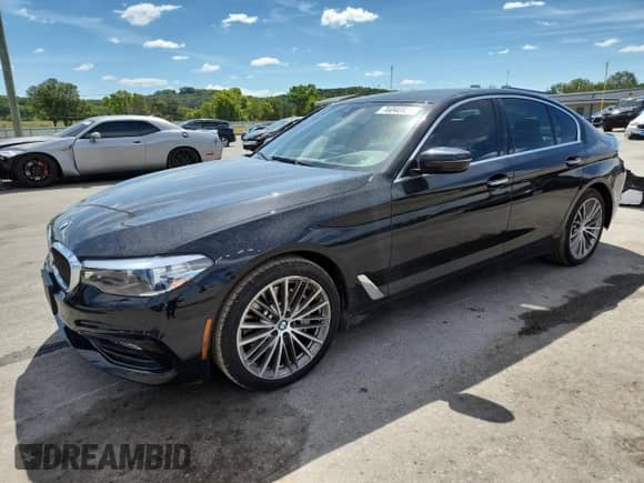 2018 BMW 5 Series 540i with VIN WBAJE5C55JWA95888, listed as a Copart auction lot 70040025 with 68,306 mi miles and Salvage title. Bid and sale history available at DreamBid. Image 1.