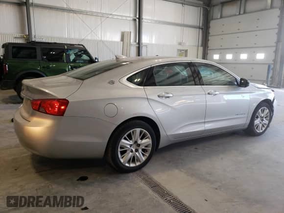 2018 Chevrolet Impala LS с VIN 1G11X5SA8JU133918, выставлен на аукционе Copart как лот 42594425 с пробегом 118 587 миль миль и Списание • Salvage title. История ставок и продаж доступна на DreamBid. Изображение 3.