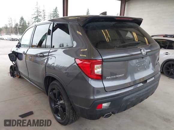 2019 Honda Passport EX-L with VIN 5FNYF8H5XKB025864, listed as a IAAI auction lot 41831663 with 73,130 mi miles and . Bid and sale history available at DreamBid. Image 3.