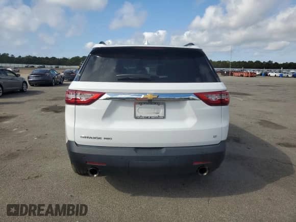 2020 Chevrolet Traverse LT с VIN 1GNEVHKW6LJ286644, выставлен на аукционе Copart как лот 83984255 с пробегом 60 928 миль миль и Списание • Salvage title. История ставок и продаж доступна на DreamBid. Изображение 6.
