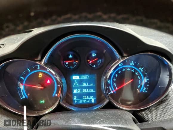 2014 Chevrolet Cruze 1LT z VIN 1G1PC5SBXE7295634, wystawiony jako Copart lot #82329965 z przebiegiem 139 795 mil mil oraz Szkoda całkowita • Salvage title. Historia ofert i sprzedaży dostępna na DreamBid. Obrazek 9.