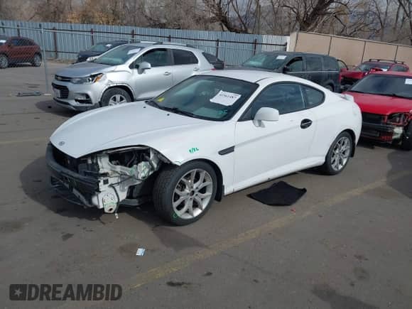 2008 Hyundai Tiburon GT z VIN KMHHN66F88U289731, wystawiony jako IAAI lot #41561487 z przebiegiem 145 944 mil mil oraz . Historia ofert i sprzedaży dostępna na DreamBid. Obrazek 2.