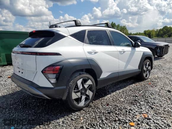 2025 Hyundai Kona Limited with VIN KM8HE3A30SU243300, listed as a Copart auction lot 64553785 with 4,875 mi miles and Salvage title. Bid and sale history available at DreamBid. Image 3.