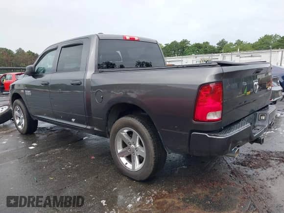 2014 Ram 1500 Express z VIN 1C6RR7KT6ES244395, wystawiony jako IAAI lot #42627393 z przebiegiem 96 503 mil mil oraz . Historia ofert i sprzedaży dostępna na DreamBid. Obrazek 3.