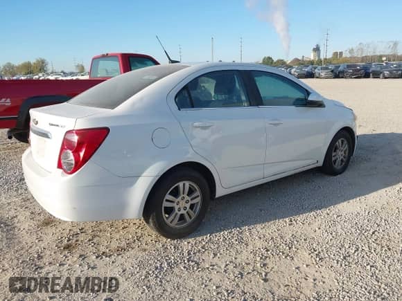 2012 Chevrolet Sonic LT with VIN 1G1JC5SH3C4114821, listed as a IAAI auction lot 43534705 with 115,586 mi miles and . Bid and sale history available at DreamBid. Image 4.