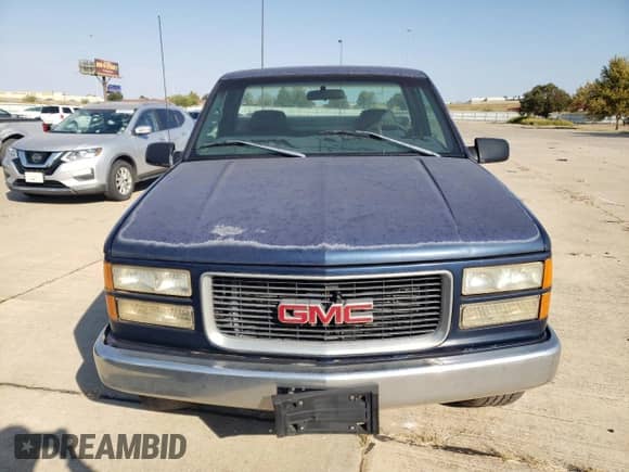 1998 GMC Sierra 1500 z VIN 1GTEC14W2WZ549558, wystawiony jako Copart lot #76294734 z przebiegiem 183 039 mil mil oraz Szkoda całkowita • Salvage title. Historia ofert i sprzedaży dostępna na DreamBid. Obrazek 5.