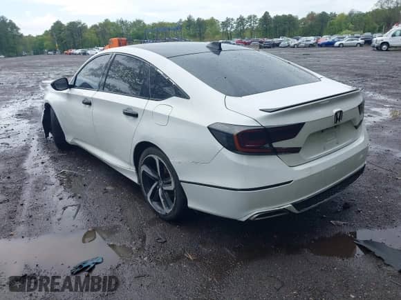 2018 Honda Accord EX-L with VIN 1HGCV2F52JA006814, listed as a IAAI auction lot 41992003 with 90,159 mi miles and . Bid and sale history available at DreamBid. Image 3.