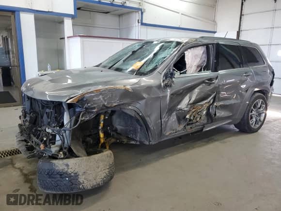 2012 Jeep Grand Cherokee SRT-8 z VIN 1C4RJFDJ8CC205823, wystawiony jako Copart lot #48073195 z przebiegiem 133 828 mil mil oraz Szkoda całkowita • Salvage title. Historia ofert i sprzedaży dostępna na DreamBid. Obrazek 1.