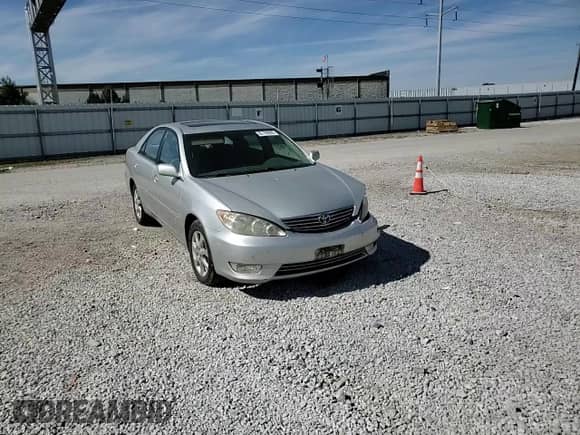 2005 Toyota Camry XLE с VIN 4T1BF30K35U614921, выставлен на аукционе Copart как лот 82188865 с пробегом 180 619 миль миль и Списание • Salvage title. История ставок и продаж доступна на DreamBid. Изображение 13.