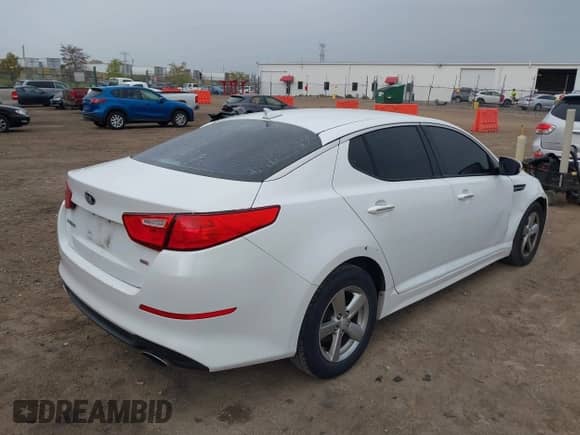 2014 Kia Optima LX with VIN 5XXGM4A78EG316421, listed as a IAAI auction lot 43439734 with 173,041 mi miles and . Bid and sale history available at DreamBid. Image 4.