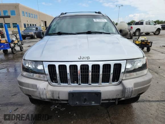 2003 Jeep Grand Cherokee Laredo with VIN 1J4GW48N03C570923, listed as a Copart auction lot 82103275 with 151,784 mi miles and Clean title. Bid and sale history available at DreamBid. Image 5.