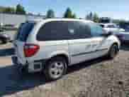 2005 Dodge Caravan SXT with VIN 1D4GP45R15B394101, listed as a Copart auction lot 65929425 with 216,391 mi miles and Salvage title. Bid and sale history available at DreamBid. Image 3.