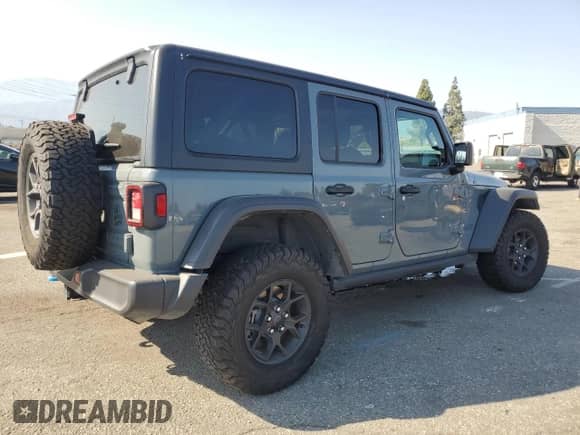 2024 Jeep Wrangler Willys with VIN 1C4RJXN69RW217616, listed as a Copart auction lot 68506995 with 23,923 mi miles and Salvage title. Bid and sale history available at DreamBid. Image 3.