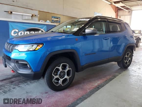 2022 Jeep Compass Trailhawk with VIN 3C4NJDDB5NT115984, listed as a Copart auction lot 85767205 with 38,761 mi miles and Salvage title. Bid and sale history available at DreamBid. Image 1.