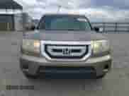 2011 Honda Pilot LX z VIN 5FNYF3H2XBB024268, wystawiony jako Copart lot #81864065 z przebiegiem 243 782 mil mil oraz Czysty tytuł • Clean title. Historia ofert i sprzedaży dostępna na DreamBid. Obrazek 5.