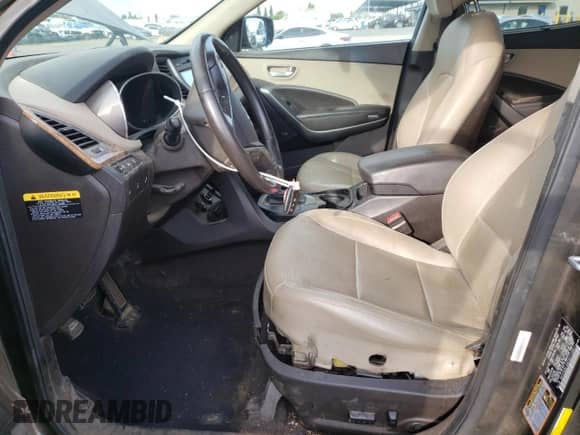 2014 Hyundai Santa Fe z VIN 5XYZUDLA6EG215861, wystawiony jako Copart lot #81632495 z przebiegiem 99 576 mil mil oraz Szkoda całkowita • Salvage title. Historia ofert i sprzedaży dostępna na DreamBid. Obrazek 7.