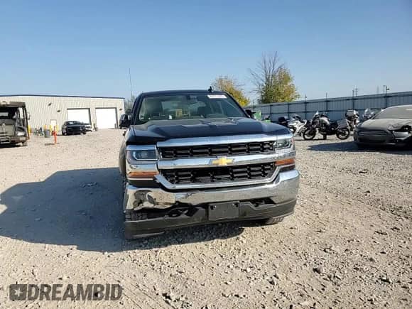 2018 Chevrolet Silverado 1500 LT z VIN 1GCVKREC6JZ323280, wystawiony jako Copart lot #84773395 z przebiegiem 57 531 mil mil oraz Nie do naprawy • Non repairable. Historia ofert i sprzedaży dostępna na DreamBid. Obrazek 13.