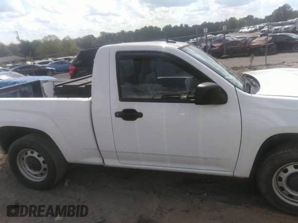 2012 Chevrolet Colorado Work Truck z VIN 1GCCSBF92C8137987, wystawiony jako IAAI lot #43297310 z przebiegiem 202 487 mil mil oraz . Historia ofert i sprzedaży dostępna na DreamBid. Obrazek 13.