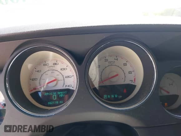 2013 Dodge Challenger SXT z VIN 2C3CDYAG6DH680794, wystawiony jako IAAI lot #43140092 z przebiegiem 162 518 mil mil oraz . Historia ofert i sprzedaży dostępna na DreamBid. Obrazek 7.