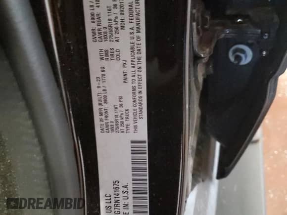 2024 Ram 1500 Big Horn with VIN 1C6RRFFG7RN141675, listed as a Copart auction lot 65241645 with 24,636 mi miles and Salvage title. Bid and sale history available at DreamBid. Image 12.