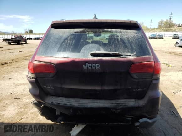 2017 Jeep Grand Cherokee 75th Anniversary with VIN 1C4RJFAG1HC739651, listed as a Copart auction lot 52576335 with 137,037 mi miles and Salvage title. Bid and sale history available at DreamBid. Image 6.