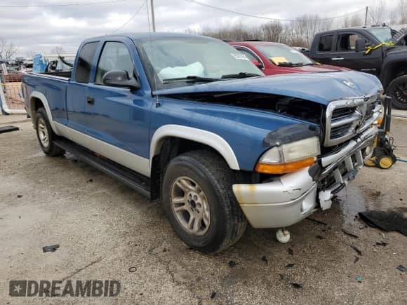 2004 Dodge Dakota SLT с VIN 1D7GL42N44S679924, выставлен на аукционе Copart как лот 85267954 с пробегом 155 295 миль миль и Списание • Salvage title. История ставок и продаж доступна на DreamBid. Изображение 4.